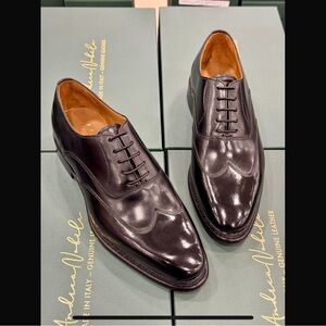 Black elegant men’s oxford leather wingtip dress shoe with Norwegian stitching